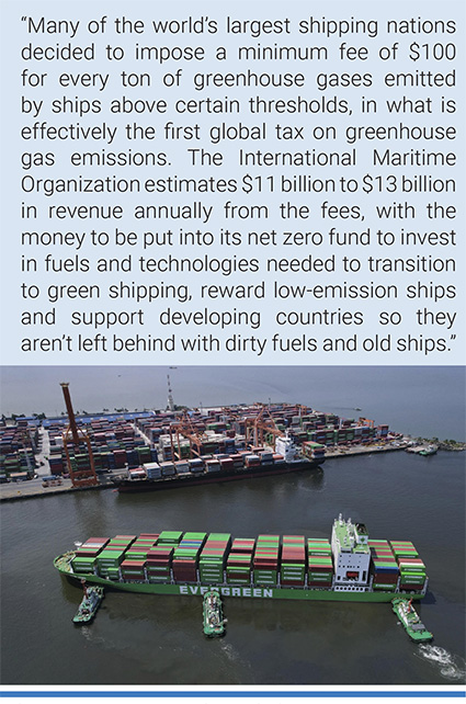 Tugboats assist a container ship as it prepares to dock at the Manila International Container Terminal. Photo: Aaron Favila/AP.