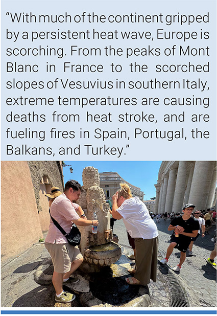 Tourists try to cool off in a fountain in Rome. Photo: Daniel Cáceres/EFE.