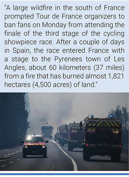 Firefighters work on a wildfire in Ille-sur-Têt, southern France on July 6, 2026. Photo credit: Thibault Camus/AP.